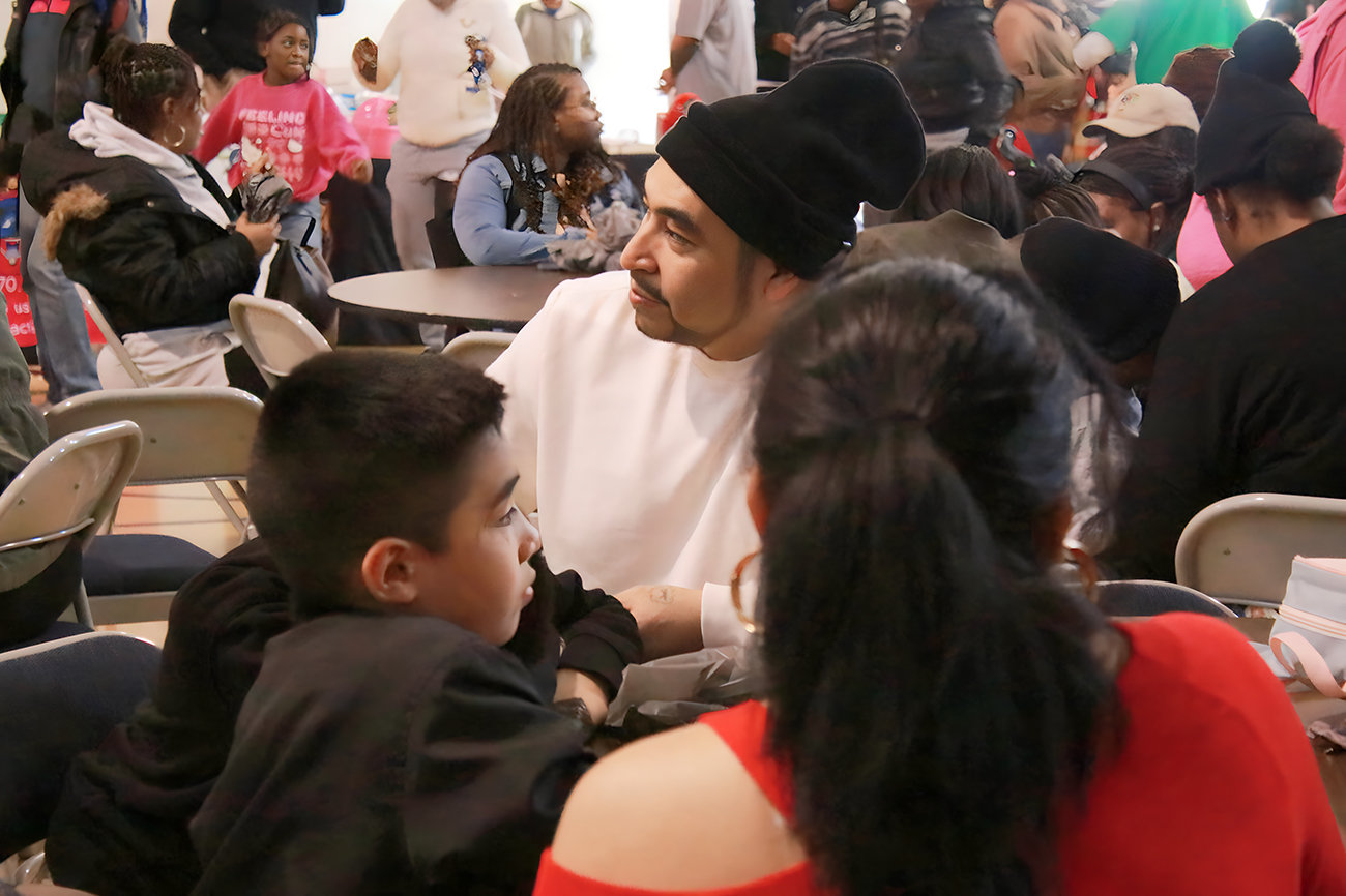 RCCA staff connecting with neighbors at a community gathering